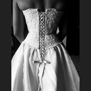woman wearing white floral tube dress thumbnail
