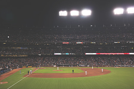 people gathering in baseball stadium thumbnail