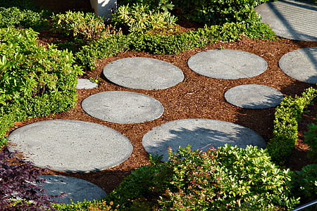 garden with round concrete pavement thumbnail