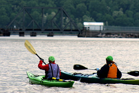 two people riding kayak during daytime thumbnail
