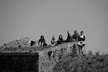 group of women sitting thumbnail