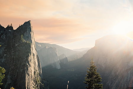 aerial photography of mountains under golden hour thumbnail
