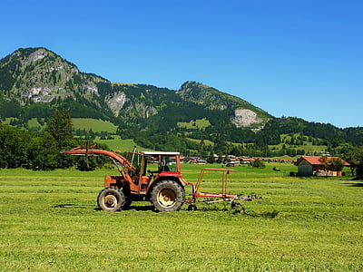 red farm track farming on field thumbnail