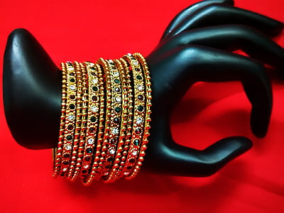gold-colored bangles with assorted-color gemstones thumbnail