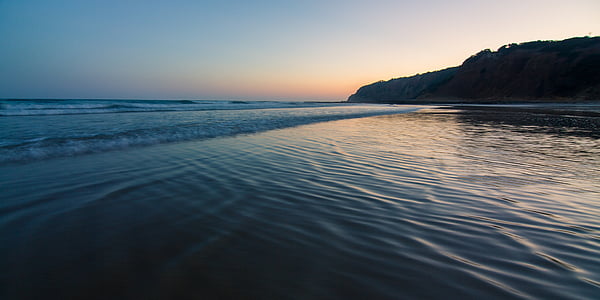 body of water beside island thumbnail