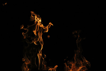 brown flame on black background thumbnail