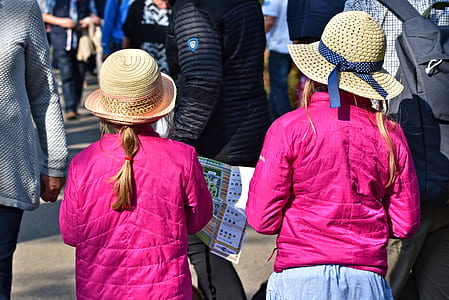 two girls walking on road thumbnail