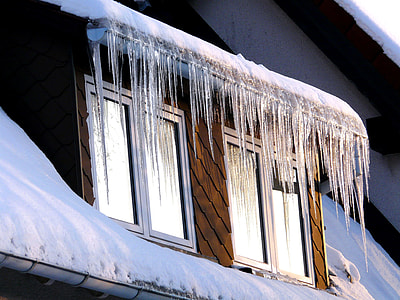 ice spike formation under window awning thumbnail