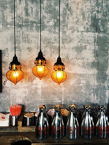 three lighted pendant lamps thumbnail