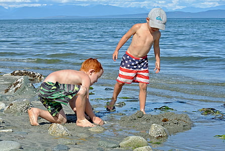two boys on seashore thumbnail