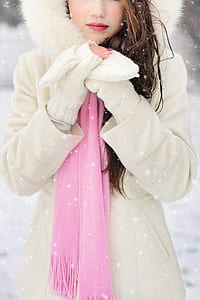 woman wearing white snow hoodie thumbnail