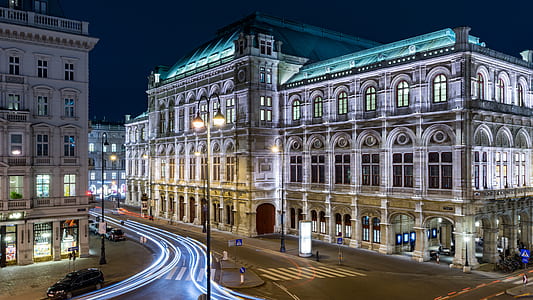 time-lapse photography of green and gray building thumbnail