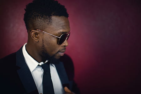 man wearing black suit jacket thumbnail