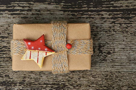 wrapped present with star accent bow thumbnail