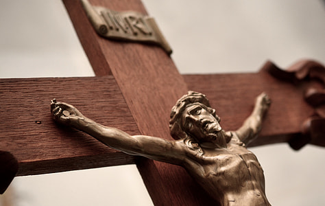 close-up photo of brown crucifix thumbnail