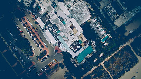 aerial photography of white concrete building thumbnail