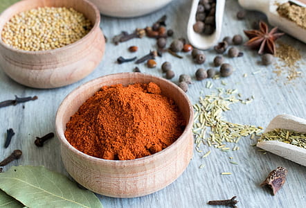 brown powder in brown bowl on table thumbnail