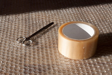 silver scissor and adhesive tape thumbnail
