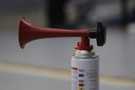 white and red blow horn thumbnail