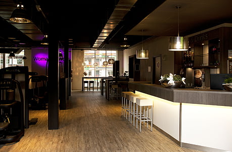 beige bar stools beside counter thumbnail