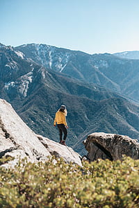 woman standing on gray mountain thumbnail