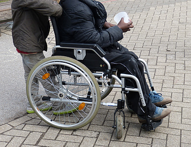 person sitting on wheelchair thumbnail