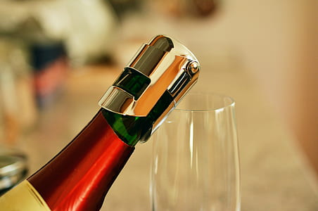 selective focus photography of liquor bottle thumbnail