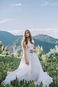 woman standing in green plant fields thumbnail
