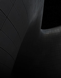 gray wall under black sky thumbnail
