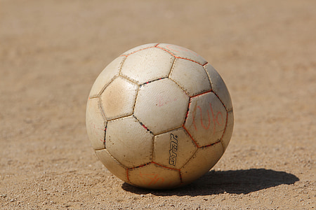 white Star sports ball in brodn dirt thumbnail