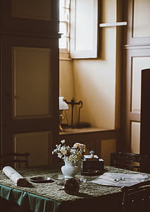 table with dining arrangement and flower thumbnail