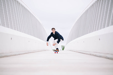 man in skateboard during daytime thumbnail