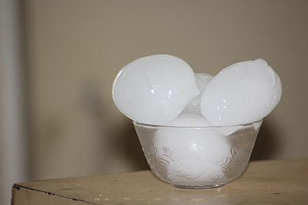 ice in glass bowl on table thumbnail