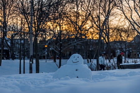 white snowman during dawn thumbnail