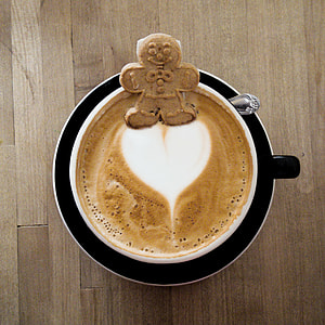 Cute gingerbread cookie floating on a latte heart at Kreuzberg, Ca. thumbnail