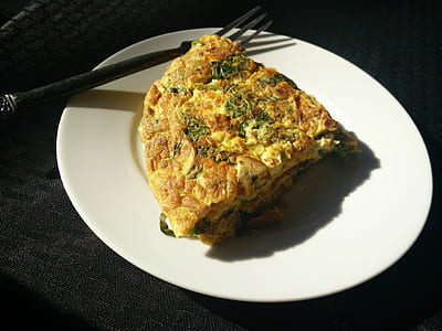 omelet on round ceramic plate thumbnail