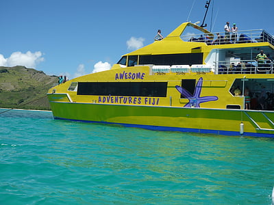 people on yellow yacht thumbnail