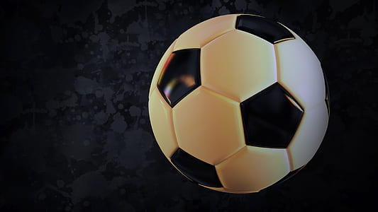 white and black soccer ball on gray surface thumbnail