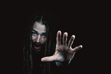 man showing his right palm photo thumbnail