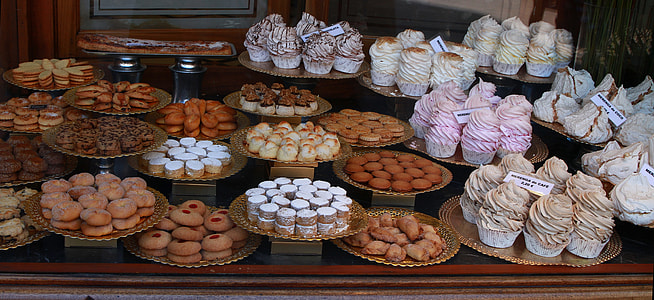 assorted cup cakes in trays thumbnail