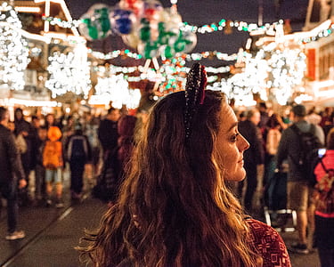 selective focus photography of woman wearing red hairband thumbnail