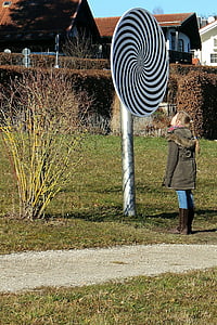 kid standing in front of white and black post thumbnail