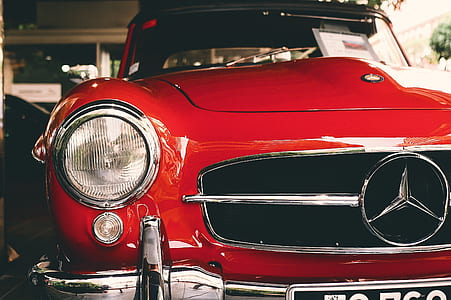 closeup photography ofclassic red Mercedes-Benz car thumbnail