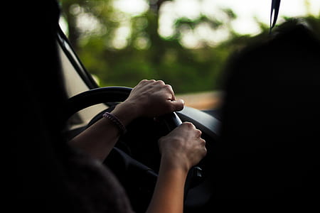 woman driving at daytime thumbnail