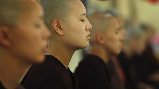 selective focus photography of person in black shirt thumbnail