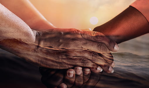 person holding hands on body of water thumbnail