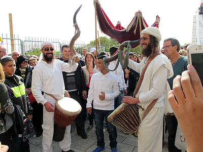 man playing musical drum during daytime thumbnail