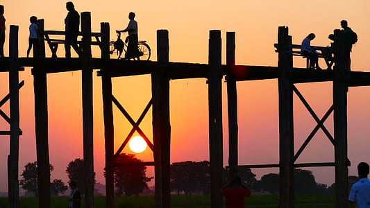 silhouette photo of people on bridge thumbnail