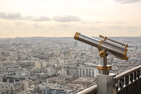 Gray and Gold Telescope on Building thumbnail