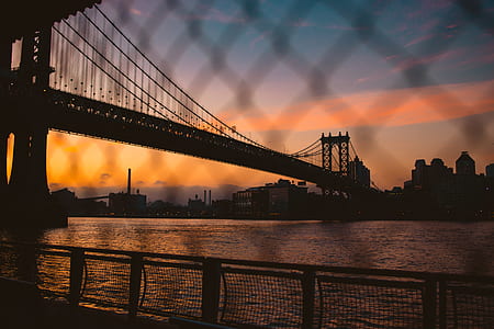 silhouette of Brooklyn Bridge, London in golden hour background thumbnail